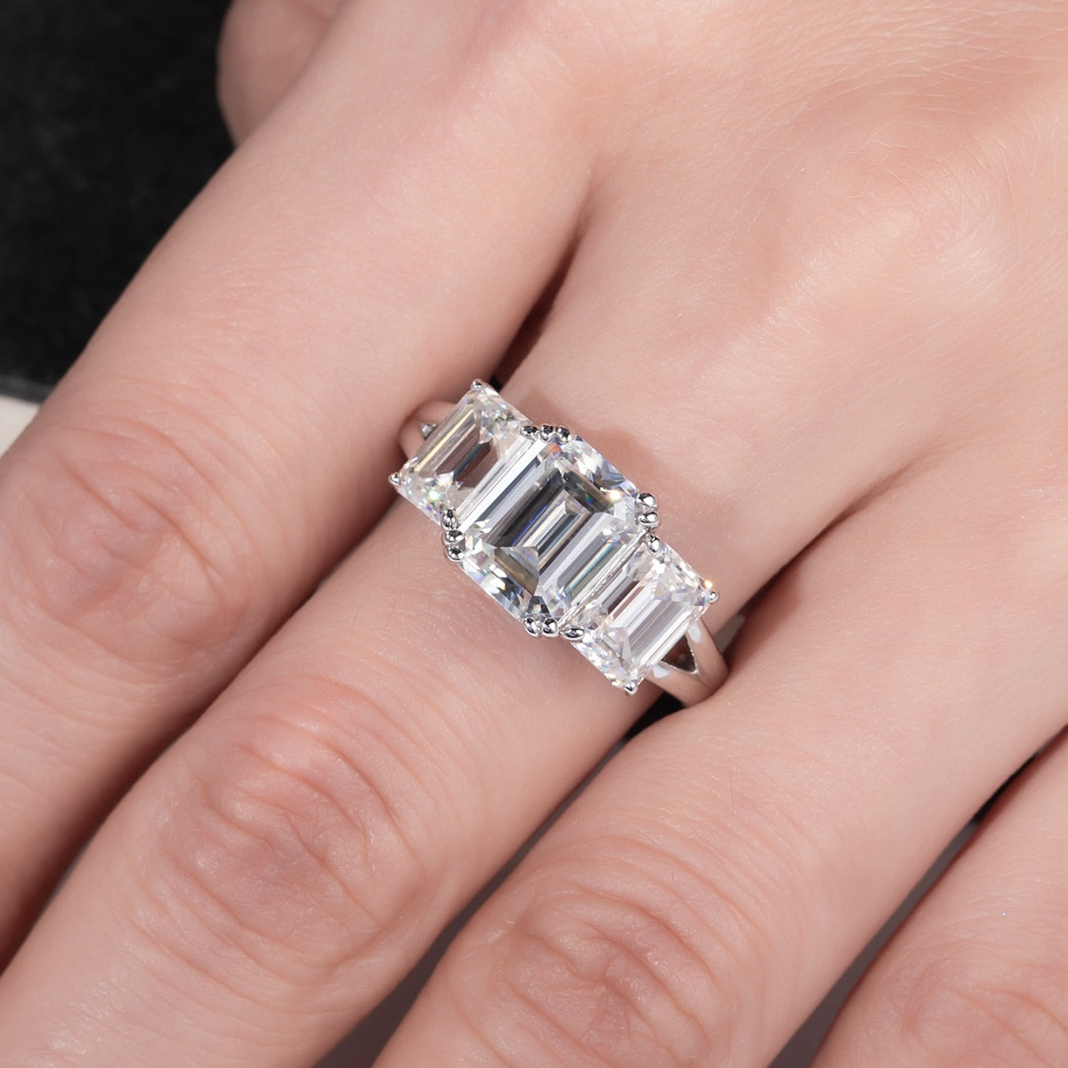 Trilogy Emerald Moissanite Ring