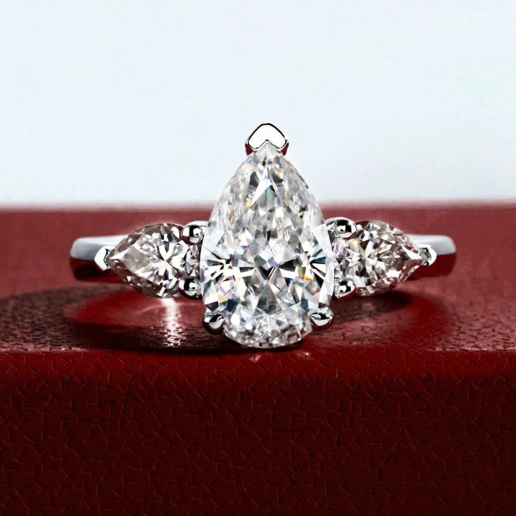 Trilogy Poire Moissanite Ring