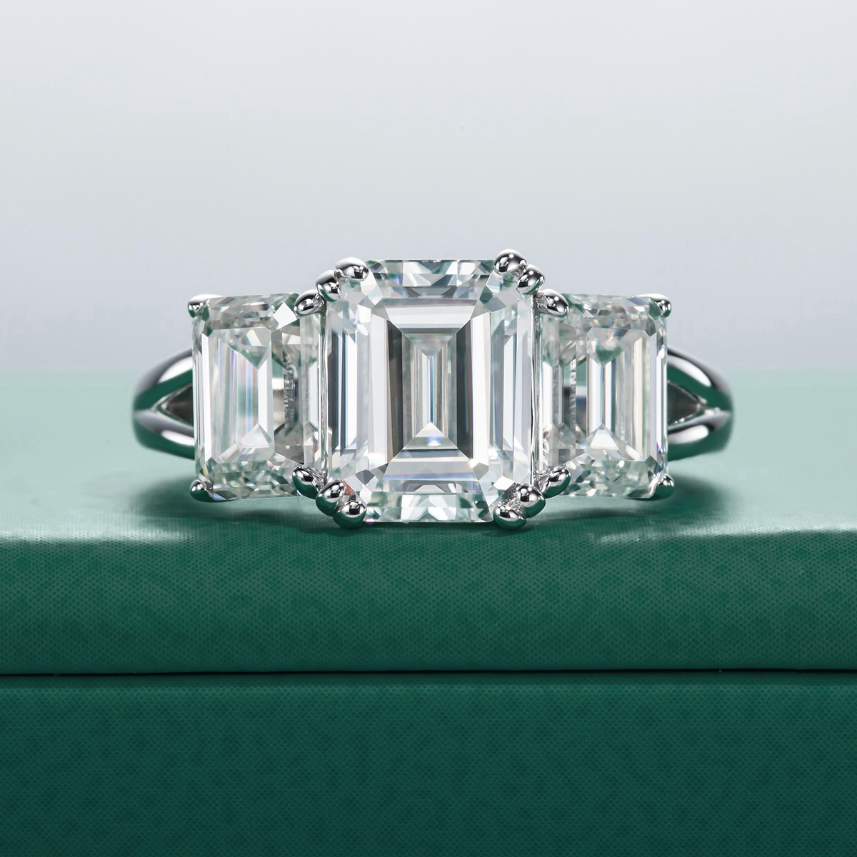 Trilogy Emerald Moissanite Ring 