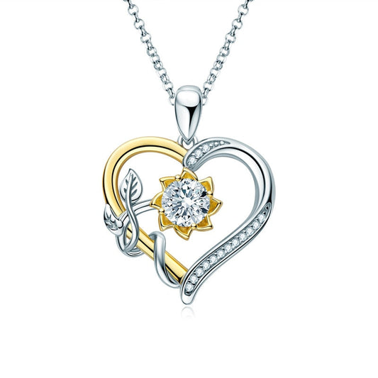 Colar Paixão Eterna Moissanite em prata banhado a ouro 18k, design de coração com pedra Moissanite central e detalhes em zircônia.