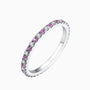 Moissanite ring with purple and clear stones in white gold-plated silver.