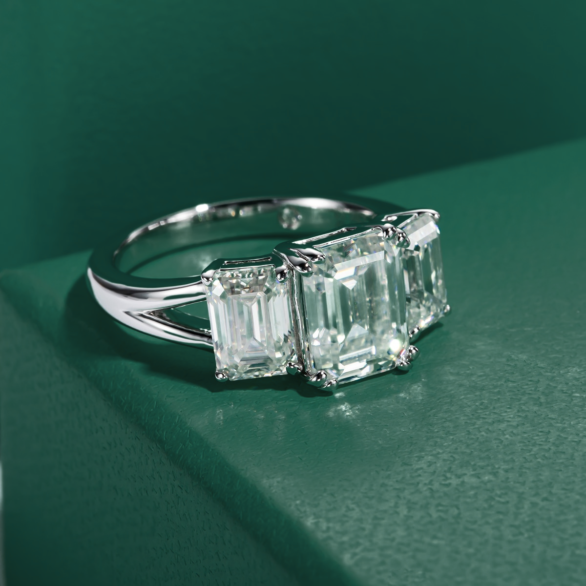 Trilogy Emerald Moissanite Ring 
