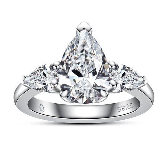 Trilogy Pear Moissanite Ring