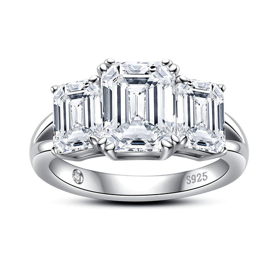 Trilogy Emerald Moissanite Ring 