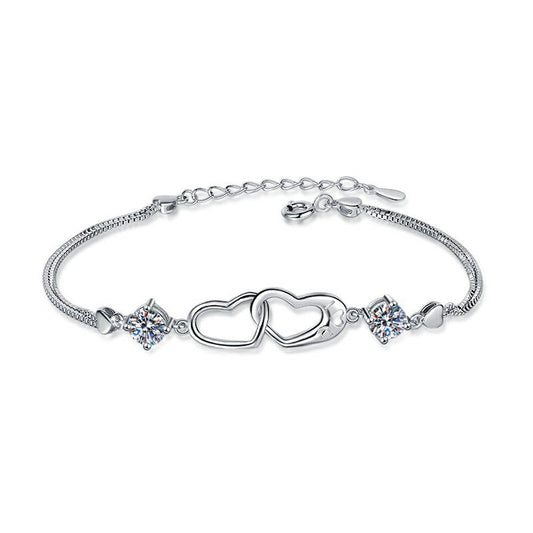 Bracelete Elo de Amor em prata folheada a ouro branco com moissanites e zircônias.